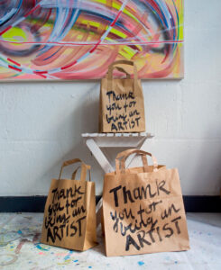 3 paper bags with black handwritten title: Thank you for being an Artist