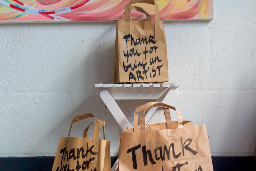 3 paper bags with black handwritten title: Thank you for being an Artist